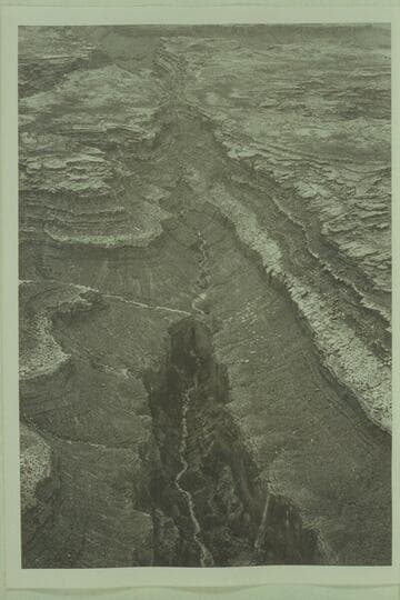 North of Gatagama Point looking southwest along tributary of 140 Mile Canyon. The natural bridge is at center immediately below the junction with the side stream from the left