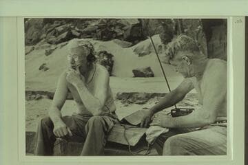 Joe Desloge and Rod Sanderson try radio contact with the BOOTOO after the CACTUS was stopped for repairs below Tuna Creek