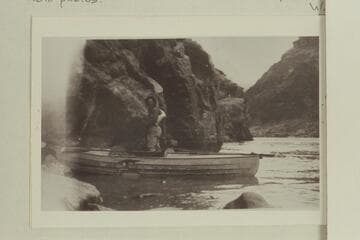 Ellsworth Kolb capsized in Waltenberg Rapid in 1911. Emery started through the rapid to help but stayed among the rocks at the edge and bashed a hole in his boat. They camped below and named the rapid "Christmas Rapid."