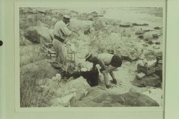 Rod Sanderson and Dock Marston bathe the dishes. President Harding Rapid