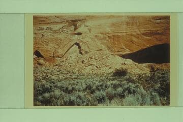 Face of canyon behind Dr. Schock dugout and fireplace. "A" type cleavage at left of picture is guide to location of fireplace
