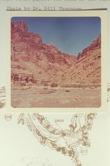 Across the head of Rapid No. 13 into Range Canyon. Mile 204.8. The Chenoweth-Hoyt table places the head of the rapid at Mile 205.0