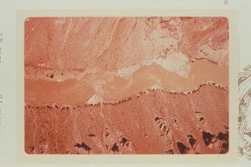 Up in Cataract Canyon from Mile 204.3. Rapids 13, 14, 15, and 16. The rock that trapped the boat of the Best Expedition can be seen off of right bank at Rapid 16