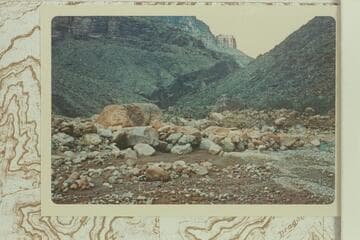 Large rock unmoved by the flood of 1966, Dec., in Crystal Creek south of the junction with Dragon