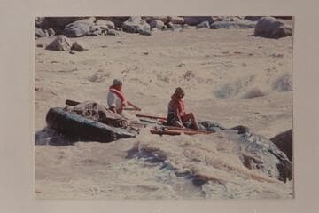 Third day of the cruise from Potash to the Dirty Devil River. The caption on the back of the print reads: 5 Big Drop Mile 202-203. Walt & Shirley Taylor