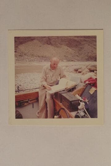 Jim Algar studies the script for the making of Disney's "Ten Who Dared." Grand Canyon