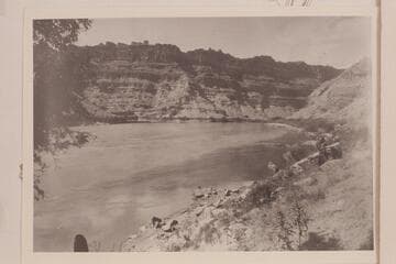 Up Cataract Canyon from Mile 216.5, left bank to the mouth of the Green River. The Green River enters from the left and the Grand River from the right