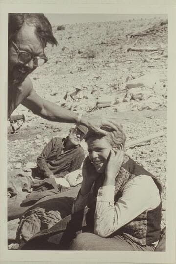 Frank LaRue making up Buzz Belknap for role in "The Colorado River Story." Gods Pocket. Ballard Atherton looks on