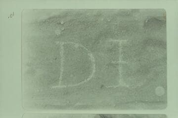 The D I 1838 inscription at Mile 221-222 at head of Whirlpool Canyon. Photo after Glade Ross had gone over the lines with a soft rock. He "noticed the inscription was put in with what appeared to be a dull center punch."