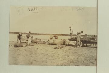 Loading equipment on truck at Needles, California. USGS party. Dodge at left; then Koms and Stabler. Moore at the wheel and Blake is left of him