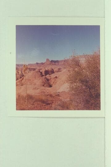 Route into Anasazi Canyon which is middle distance. Glen Canyon is beyond. Lion Rock and Fifty Mile Mountain on skyline