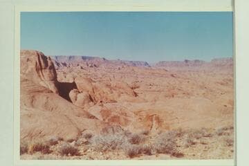 Across the forks of 73 and down Glen Canyon from the top of Black Brush Mesa. The butte at left is between the northeast fork and the middle fork