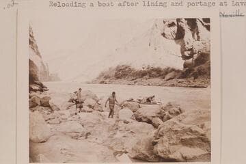 Reloading a boat after lining and portage at Lava Falls. Left to right: Joe Desloge; Garth Marston, Otis Marston