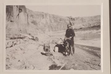 Pat Flattum and the Indian motor used in outboard trip in Glen Canyon