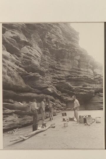 Camp on right bank near Mile 115; Tapeats formation. Left to right: Jordan, Sanderson, Taylor and MacDonald