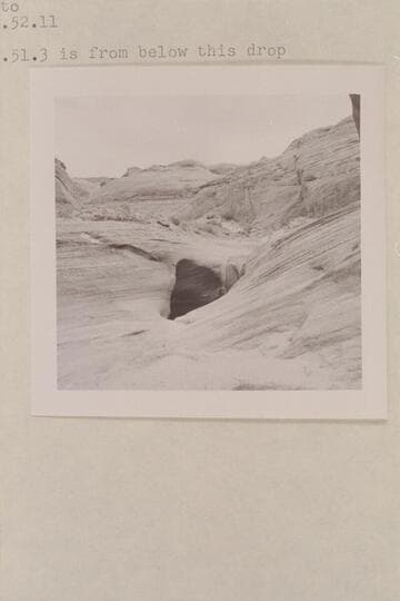 Small drop of about 5 ft. in bottom of southwest fork of 7s. Below the point of trail entry. 599 GNCN 73.51.3 is from below this drop