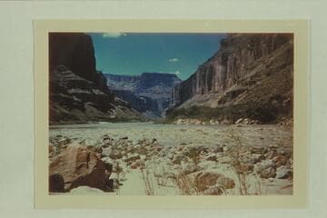 Kwagunt Rapid. The view is up the Colorado River. Carlton Boyd Moore was drowned in the river a few miles below this point on the day this picture was made