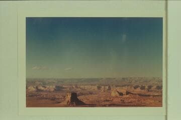 Tower Butte from over Navajo Canyon. Northerly to Fifty Mile Mountain on the skyline. Called Beacon Rock by Woolley in 1869