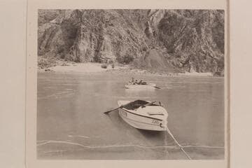Garth in the stream at Bright Angel Creek. Lucile Hiser sits on the bow with Moulty Fulmer in the cockpit