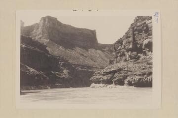 Tanner Wash at left. Mile 14.4. Head of Sheerwall Rapid which is submerged at the 60-65,000 cfs. which was the approximate stage when this 35mm photo was made