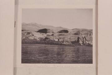 Above Escalante. Black's name in one cave?