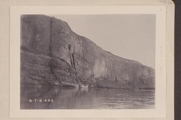 Near upper end of Glen Canyon. The formation is now known as Tapestry Wall due to the weathering. Mile 136