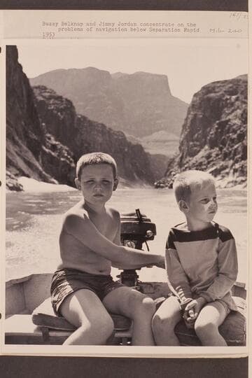 Buzzy Belknap and Jimmy Jordan concentrate on the problems of navigation below Separation Rapid. Mile 240