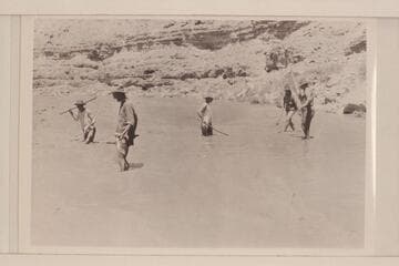 Killing fish with sticks. Mud flood. Honaker. Left to right: Blake; Hyde; Loper; Christensen; Trimble