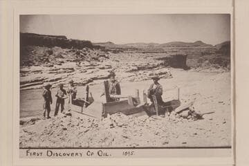 First discovery of oil at Mexican Hat. Photo captioned, "Petroleum Well, San Juan River, Utah"