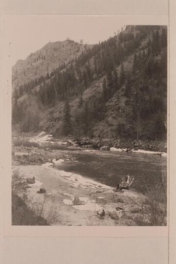 Camp on the icy beach. The tent is rigged on the scow