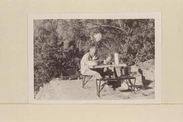 Harry Aleson digs the sand from his ear. Camp above Smith Fork. Mile 132
