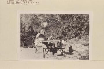 Harry Aleson prepares for breakfast. Smith Fork