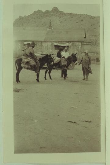 Mr. Flake talks with Indians on the move. Between Grand Canyon and Navajo Bridge at the time of the Bridge dedication. Freeman photo