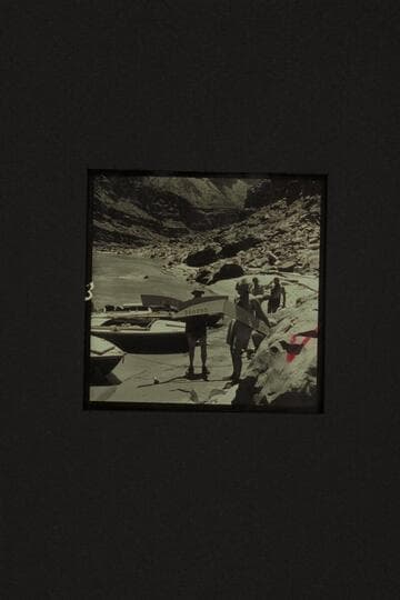 The spran shields which were torn from the decks in North Canyon Rapid. Left to right: Taylor, Masland, Desloge, Belknap. 21 Mile Rapid