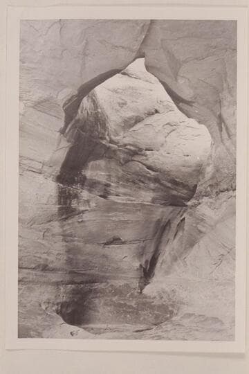 Ba-Sah Bridge, Navajo Canyon. Note the large pot-hole directly below the bridge. There is a deep pool of water with surface about six feet below the rim