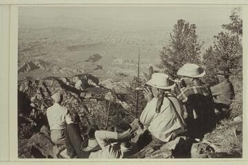 Viewing the terrain between Navajo Mountain and the Henry Mountains. The junction of the San Juan and Colorado Rivers is in the middle distance. L to R: Marston, Tom Daly, Masland, Belknap, Grey Mountain