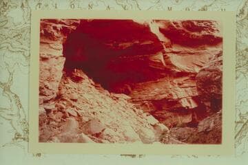 Cave in Tuckup Canyon about one mile upstream from mouth of Cottonwood. Annie Herrington, 10 years of age, stands in the cave
