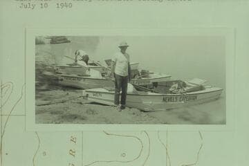 The three Nevills sadirons loading at Green River, Utah prior to departure for a transit of the river course to Lake Mead. Barry Goldwater facing camera