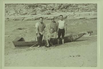 Run on the San Juan River in a Gold-Flat boat. Mexican Hat where the trip ended. Barry Goldwater is at left; Norman Nevills kneels