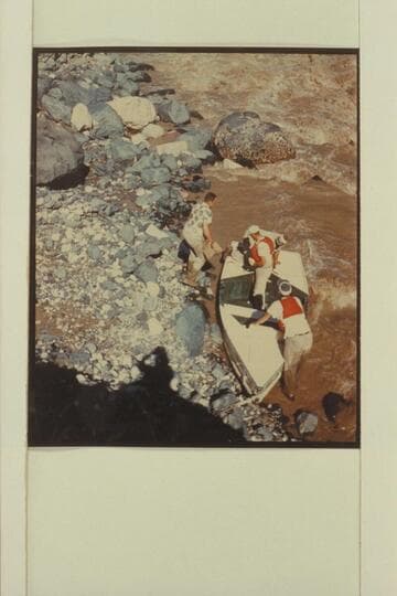 Preparation for portage of sadiron of Wright-Stavely fleet. Mouth of Prospect Canyon at Vulcan Rapid