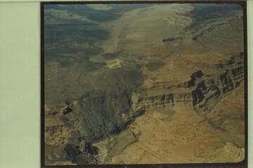 View up Toroweap Valley; Vulcans Throne at the edge of the Canyon. The head of Vulcan Rapid can be seen at the mouth of Prospect Canyon at lower left