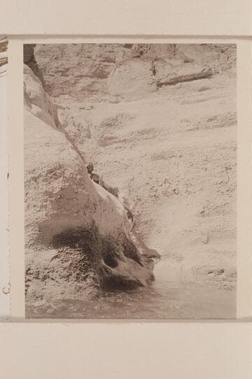 Travertine encrustations at mouth of Supai Creek. Margaret Marston and Joe Desloge climbing