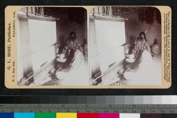 A Hopi blanket weaver sitting at a loom