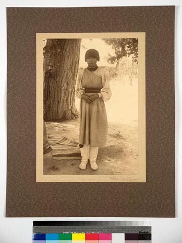 Around San Juan, New Mexico. Girl wearing typical buckskin boots