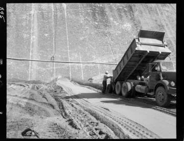 Big Creek - Mammoth Pool - Dumping rock in vertical drain