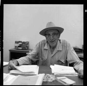 Hydro Generation Supervisor E. I. Bulpitt at his desk