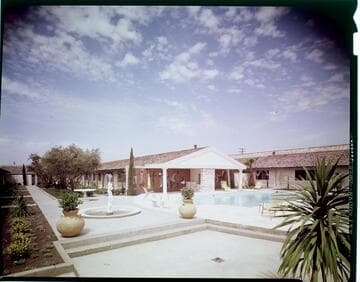 Apartment or condominium complex with Island motif swimming pool and recreation area