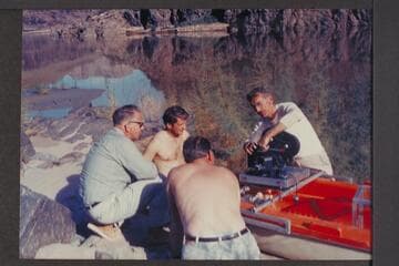 Jake rigs camera on Sportyak; 217 Mile Rapid. Bill Lindsley; Bill Wynn