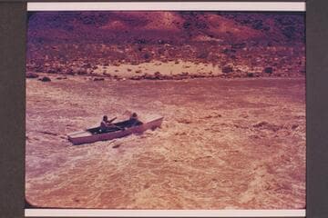 One of the Nevills punts in 13-ft. rapid. MH gauge: June 16: 8, 510. June 17: 8,890