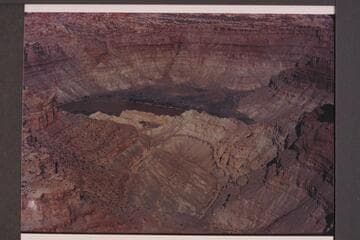 Down Butler or Red Lake Canyon to its mouth. Spanish Bottom at opposite side of the river. Approx. gauge: 30,000 cfs